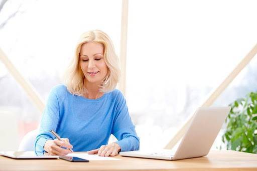 Woman tracking goals