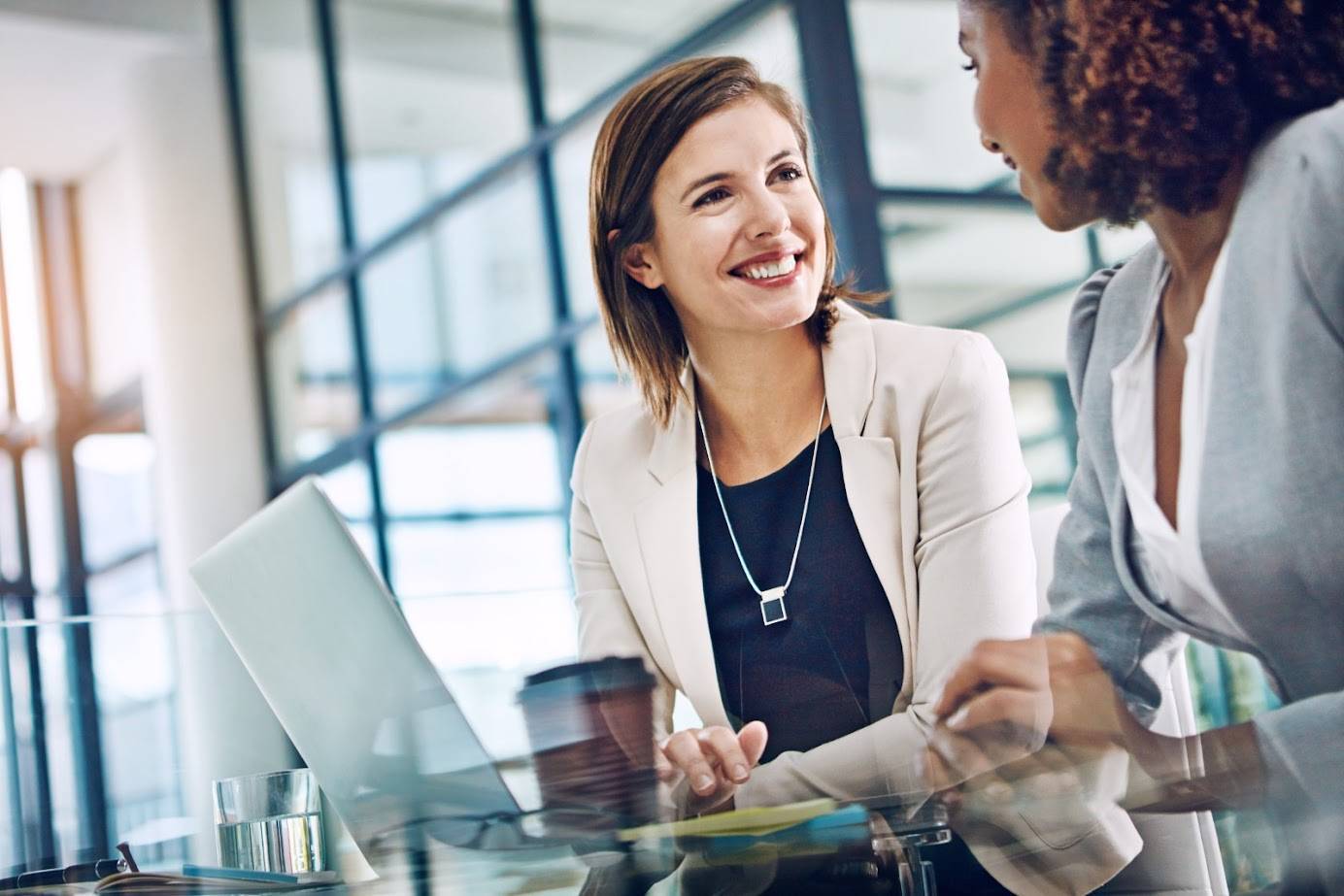 Businesswomen chatting