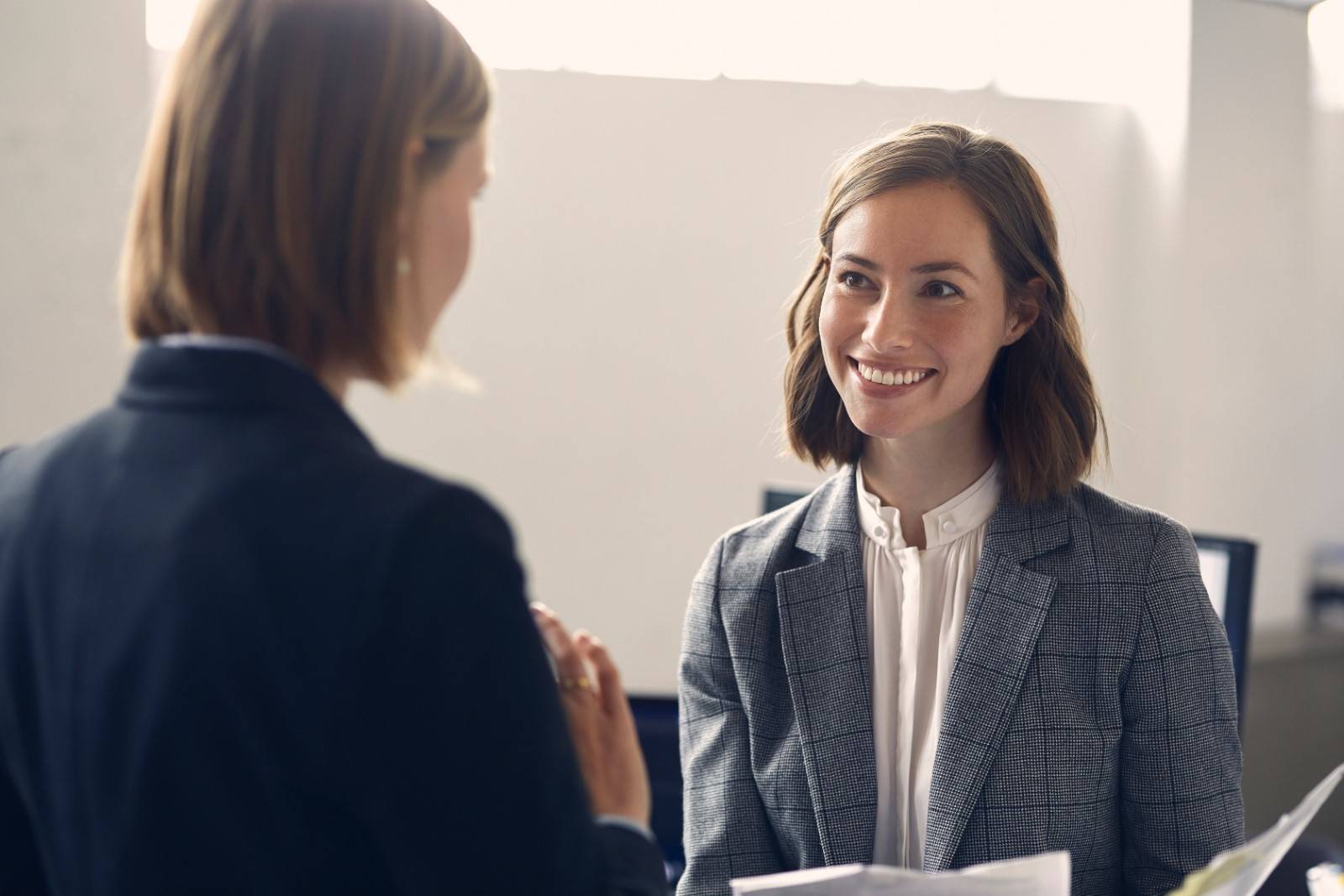Businesswomen talking