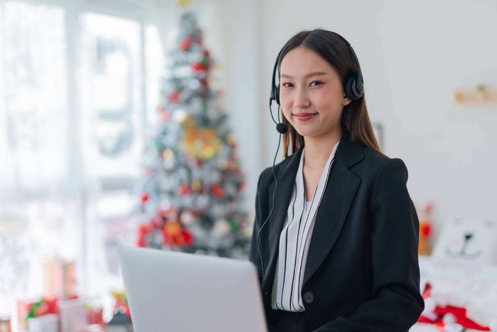 Woman working remotely during holiday season