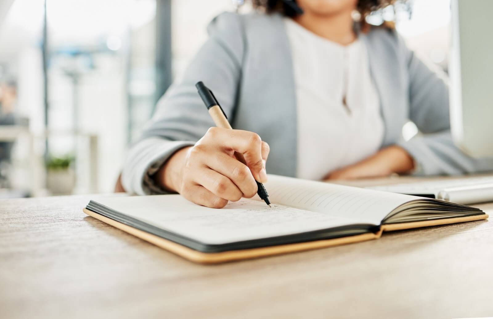 Businesswoman journaling