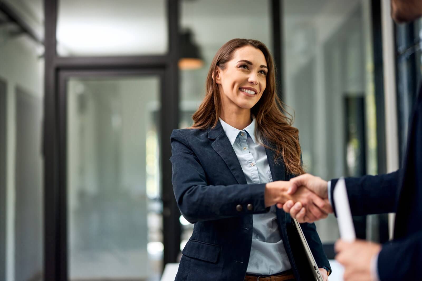Businesswoman shaking hands