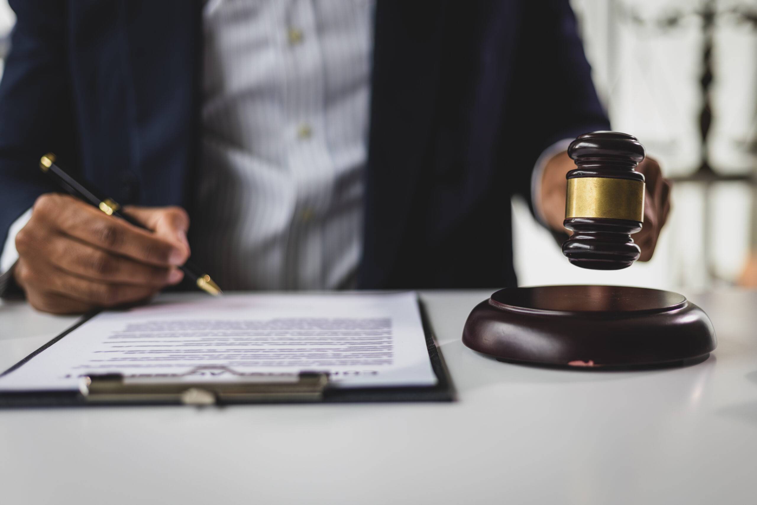 man striking a gavel