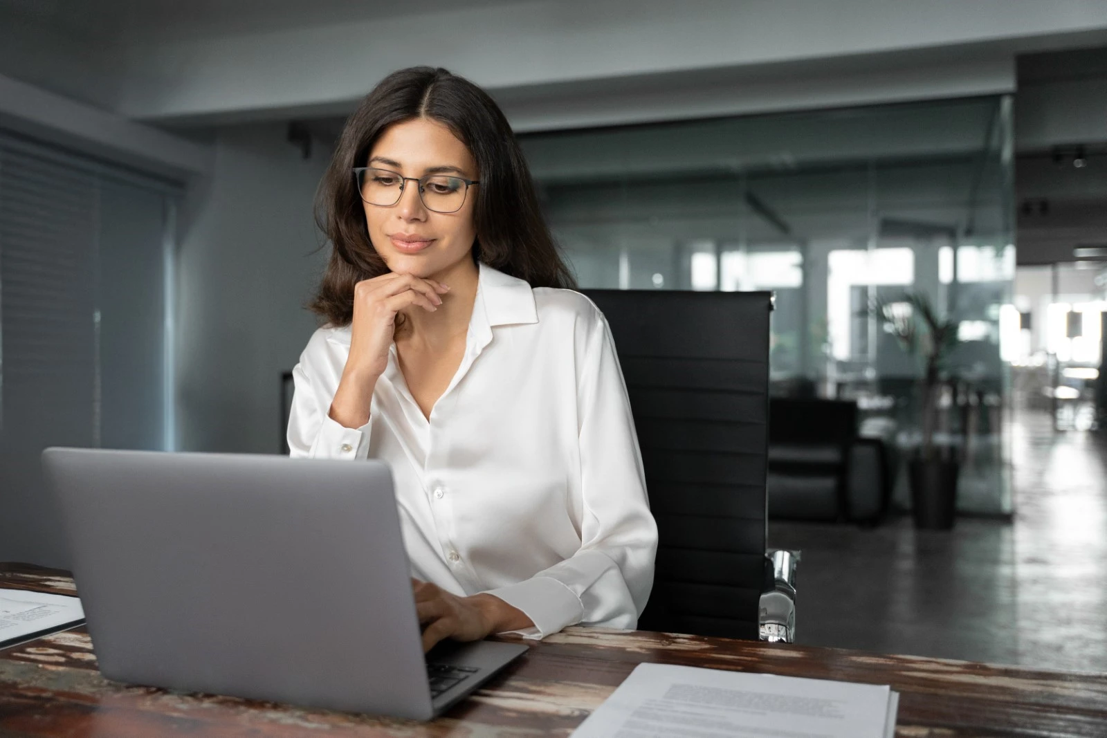 Businesswoman focused at desk