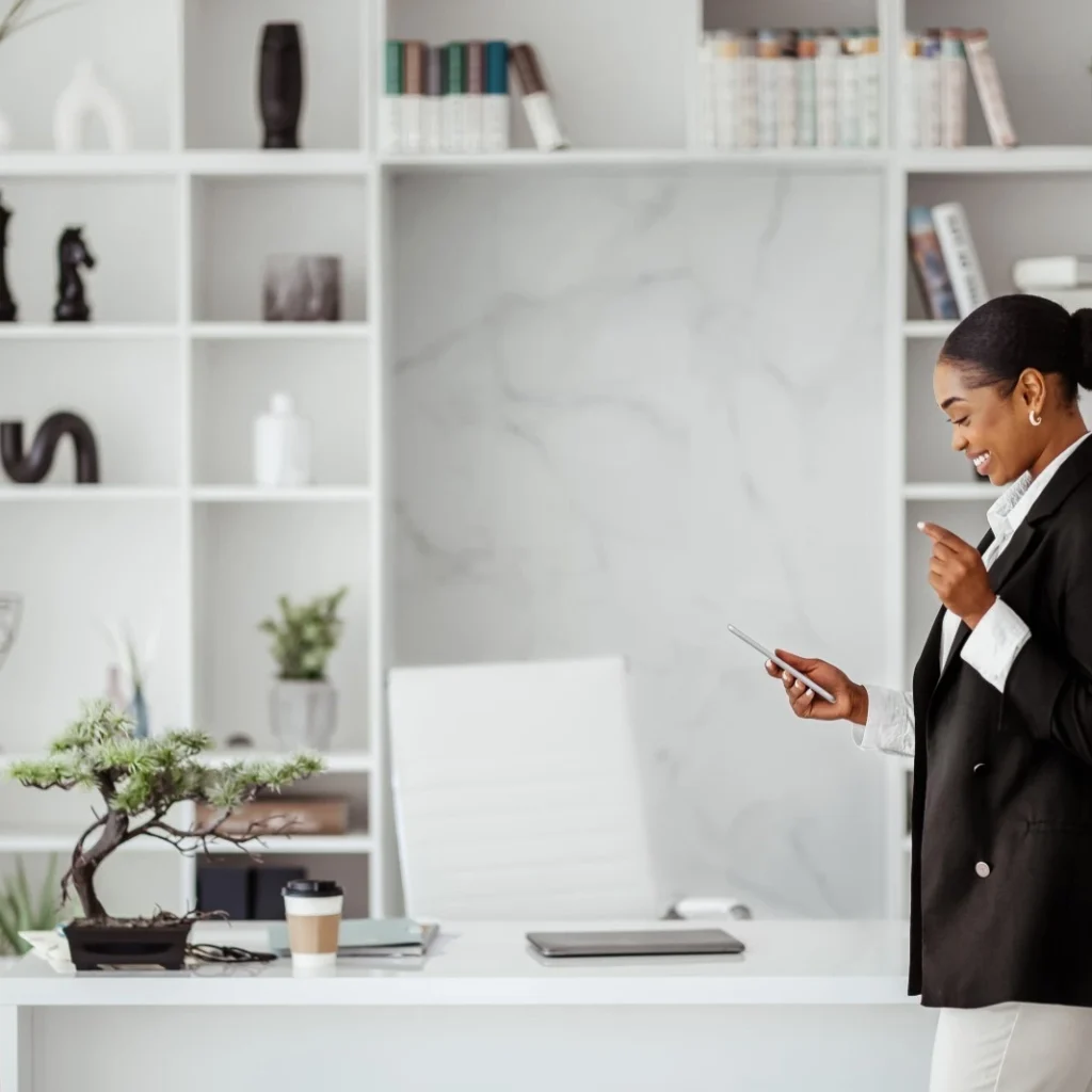 Businesswoman walking around while on phone
