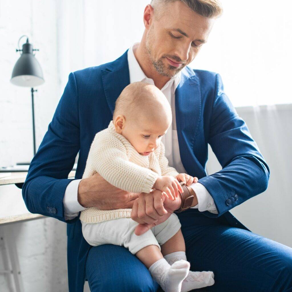 Father holding baby