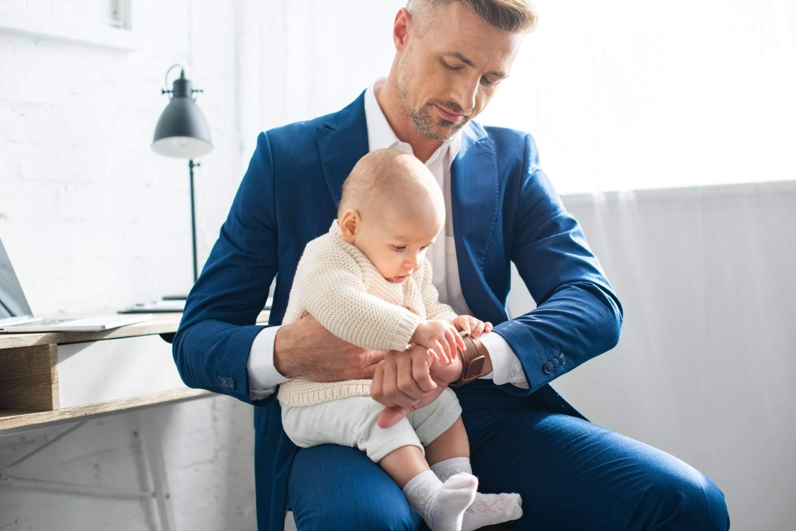 Father holding baby
